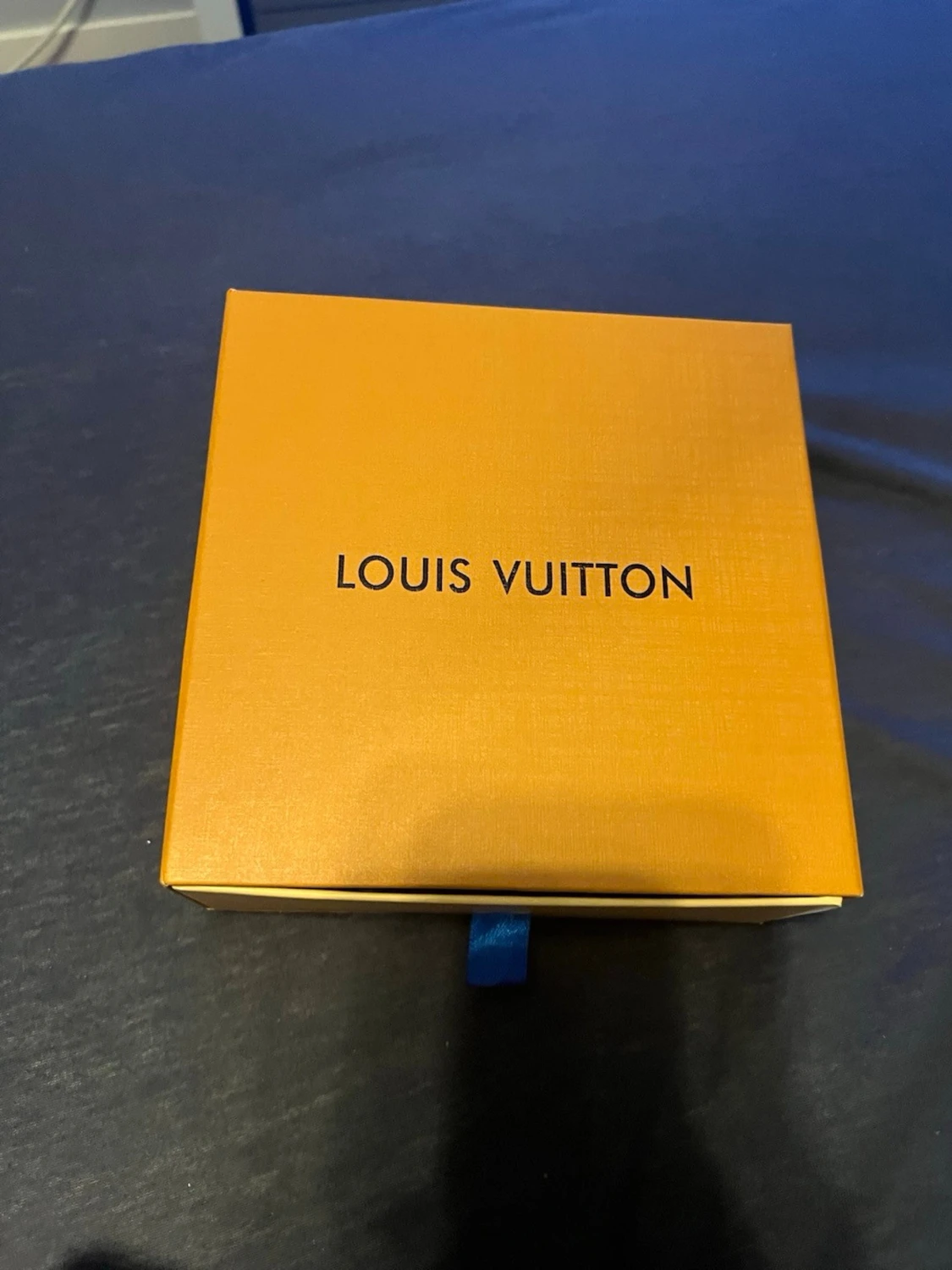 Snyggt svart bälte med orange box