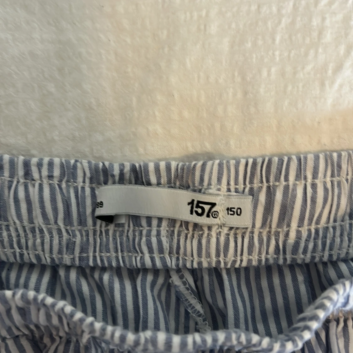 Randiga byxor från 157, stl 150 - 1