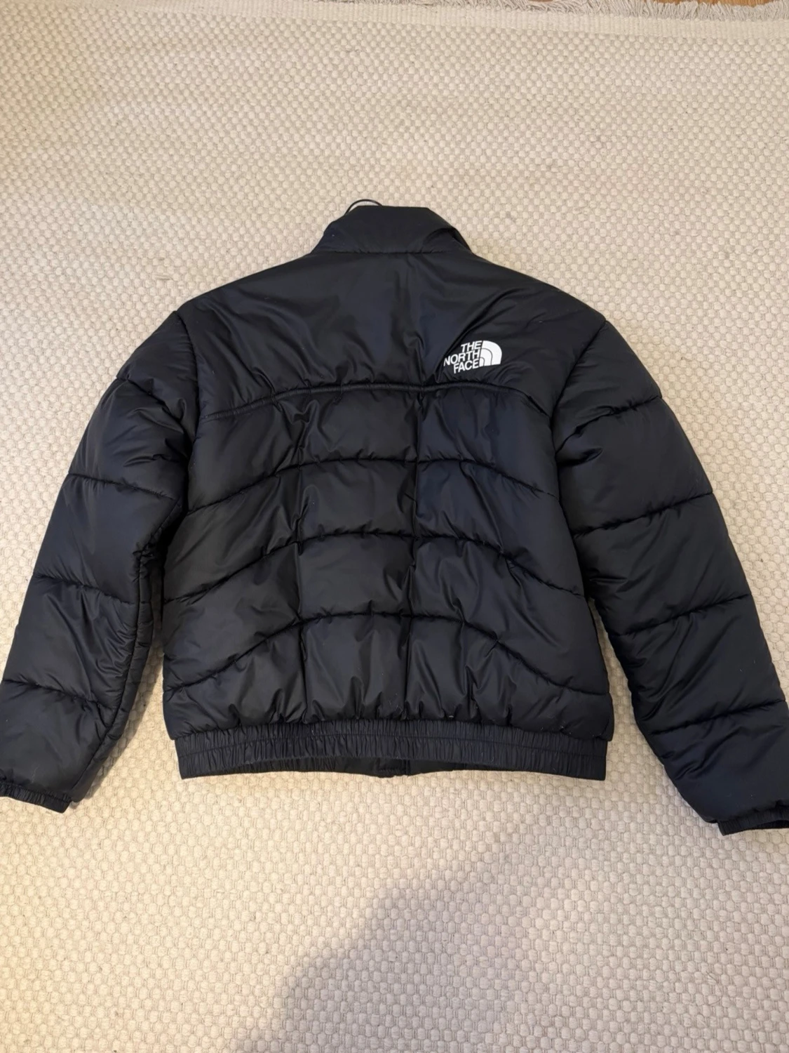 Svart pufferjacka från The North Face - 1