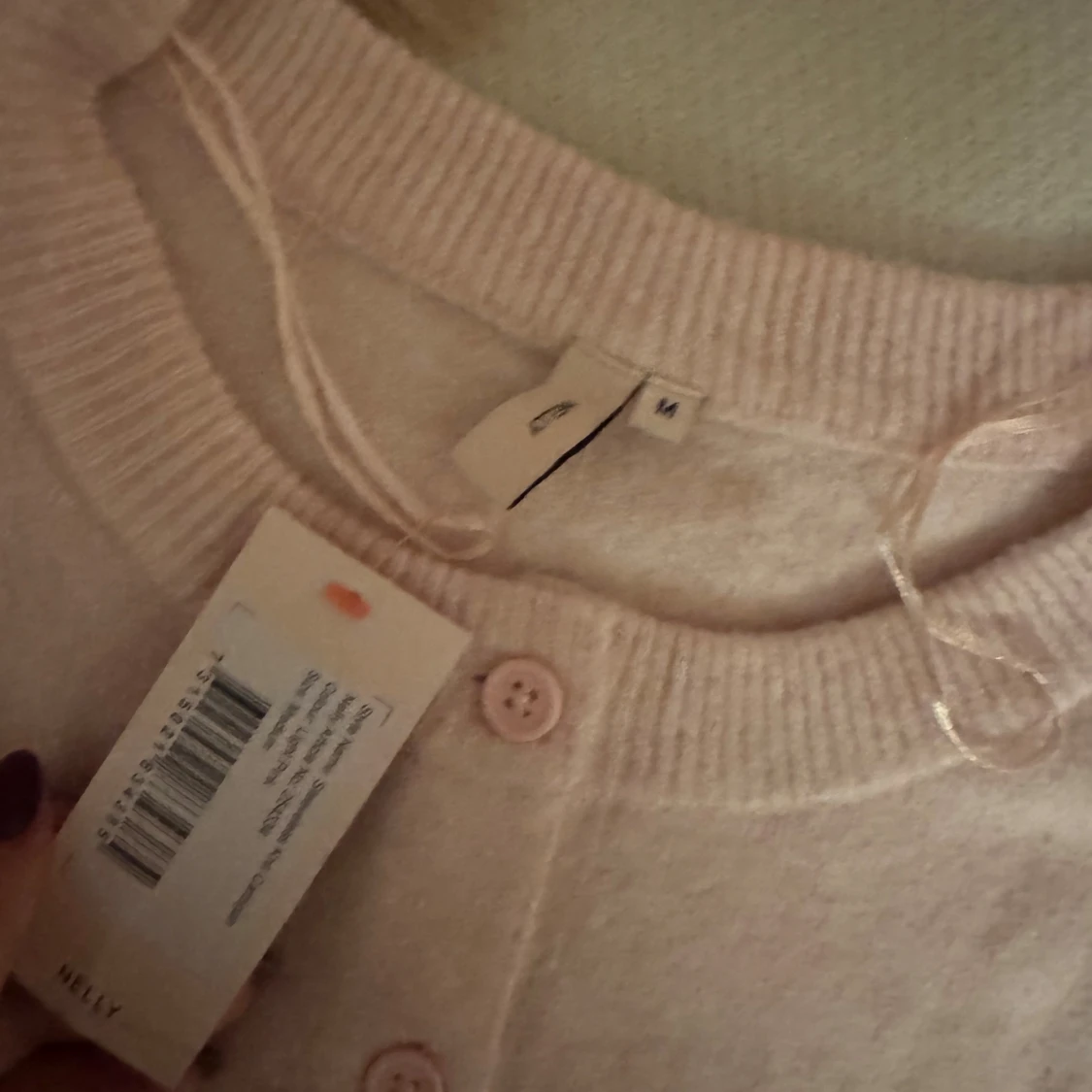 Ljusrosa stickad tröja  från Nelly - 1