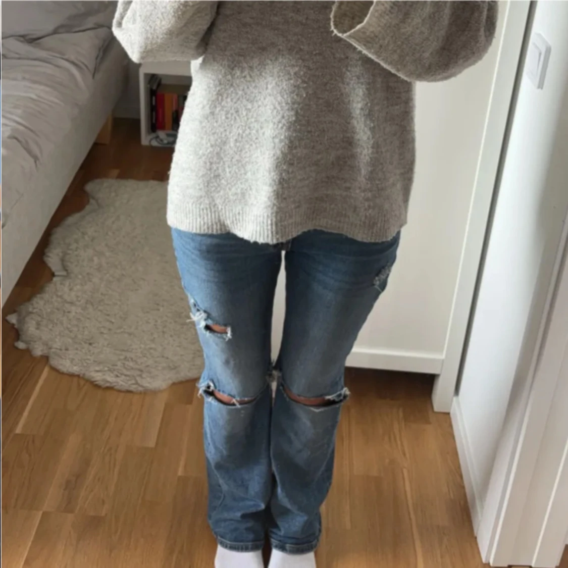Blåa bootcut jeans med lågmidja