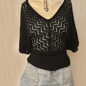 Knitted top  - Smocked wais v neck 