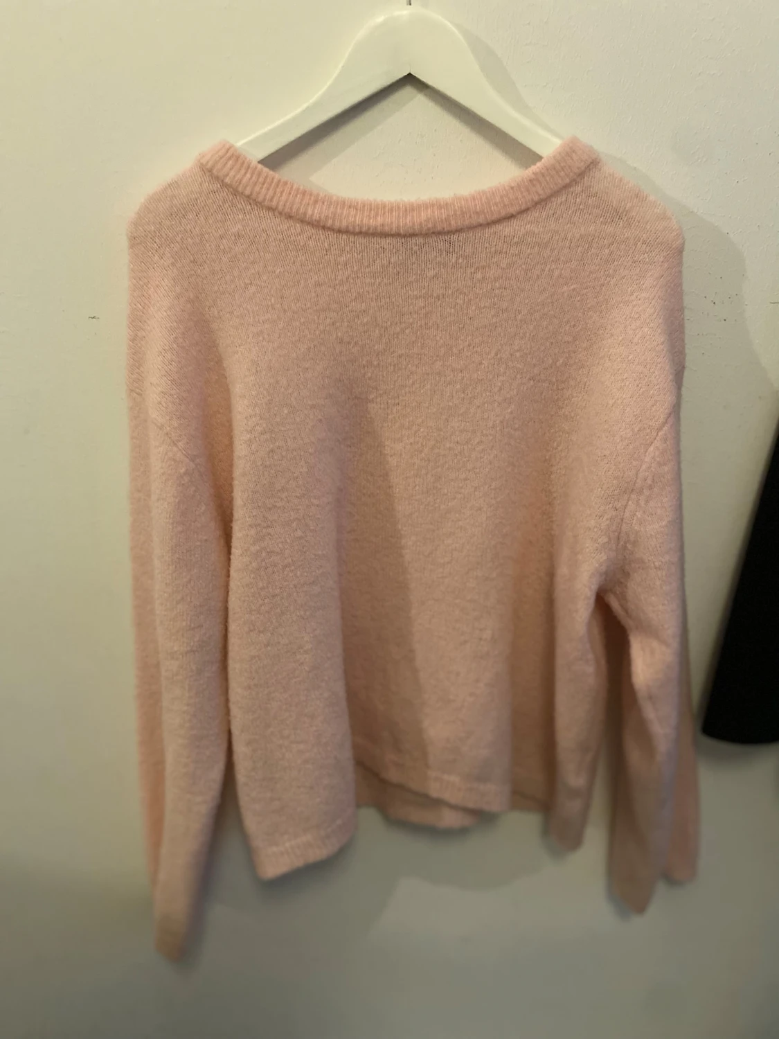 Ljusrosa stickad tröja