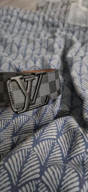 Svart l v bälte / ruttigt - Helt nytt svart l v bälte