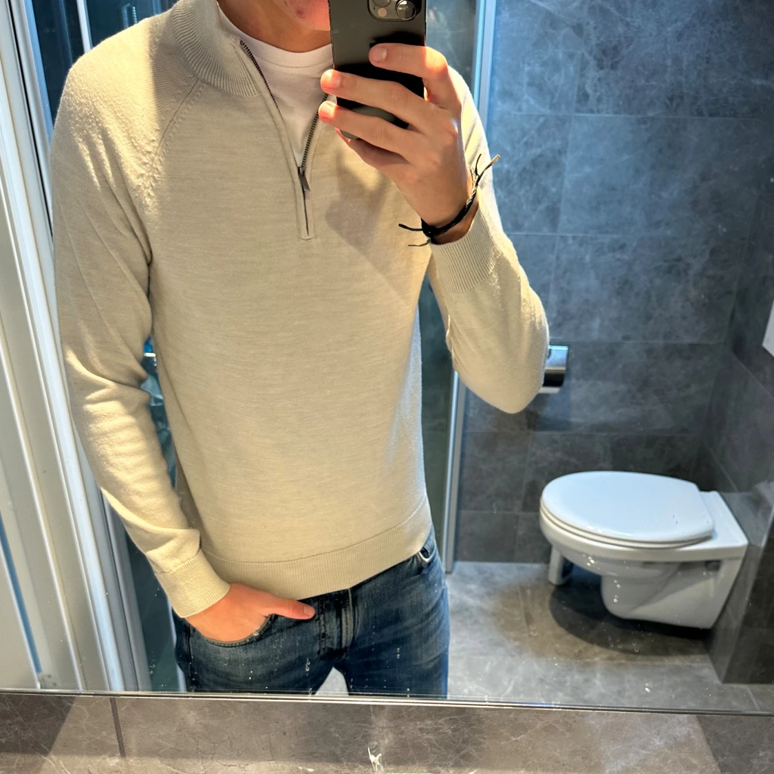 Beige half zip stickad tröja