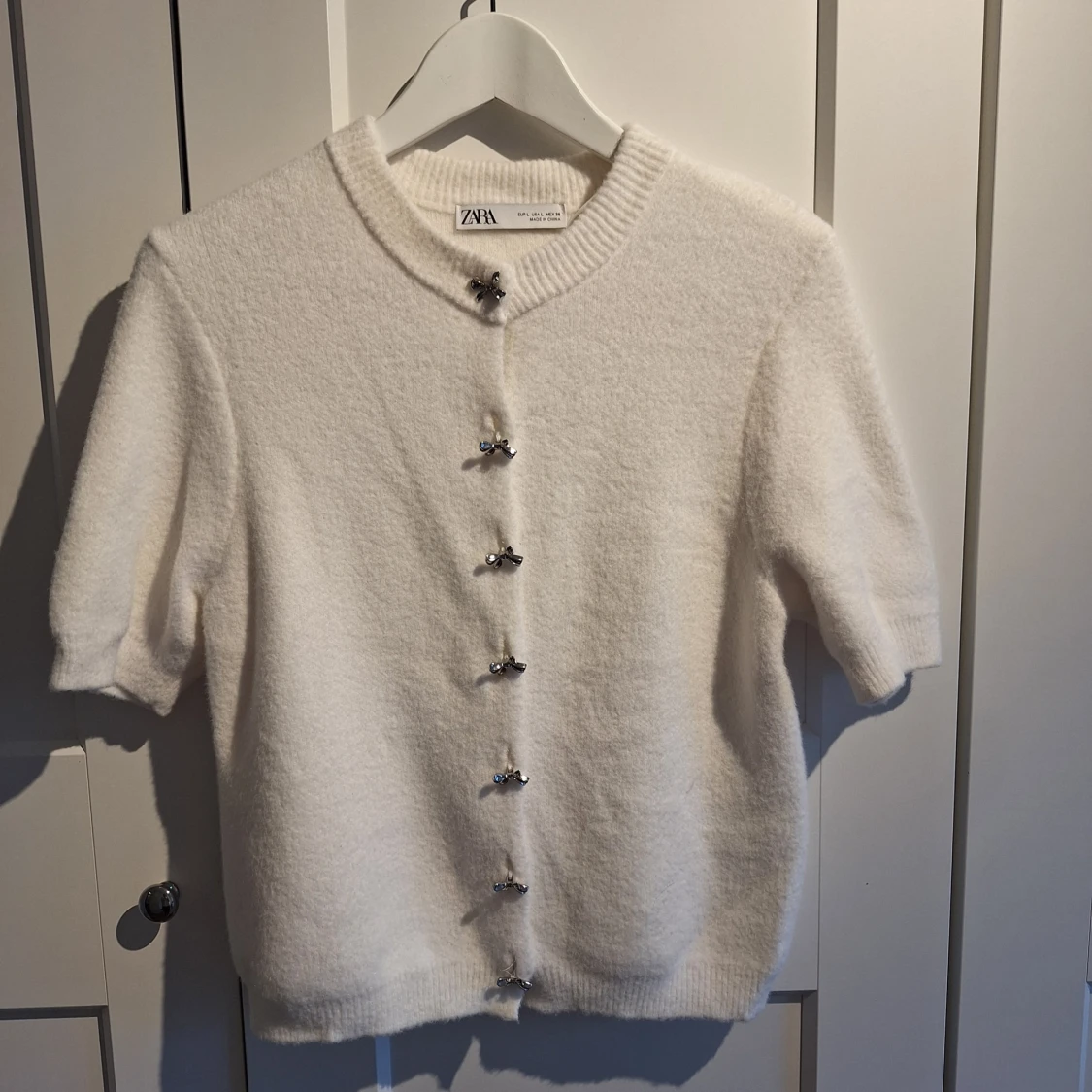 Vit kofta med kort ärm från Zara