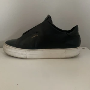 Axel Arigato laceless - Ett par Axel Arigato laceless skor. 