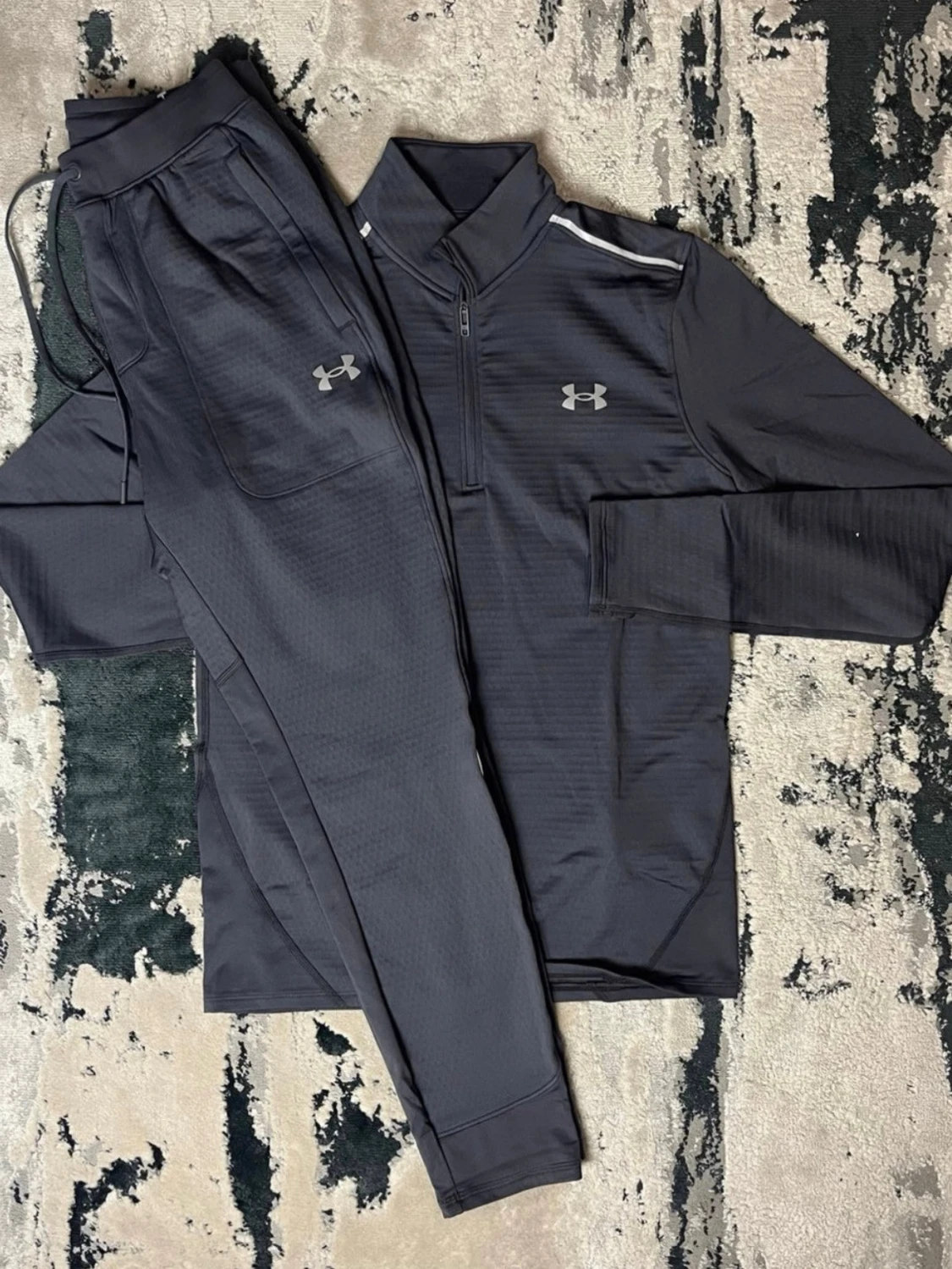  Under Armour tracksuit. 