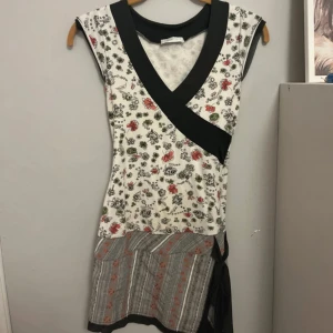 Söt kort klänning - Kjolen är ganska kort men om man gillar att sy kan man göra överdelen till en tröja 