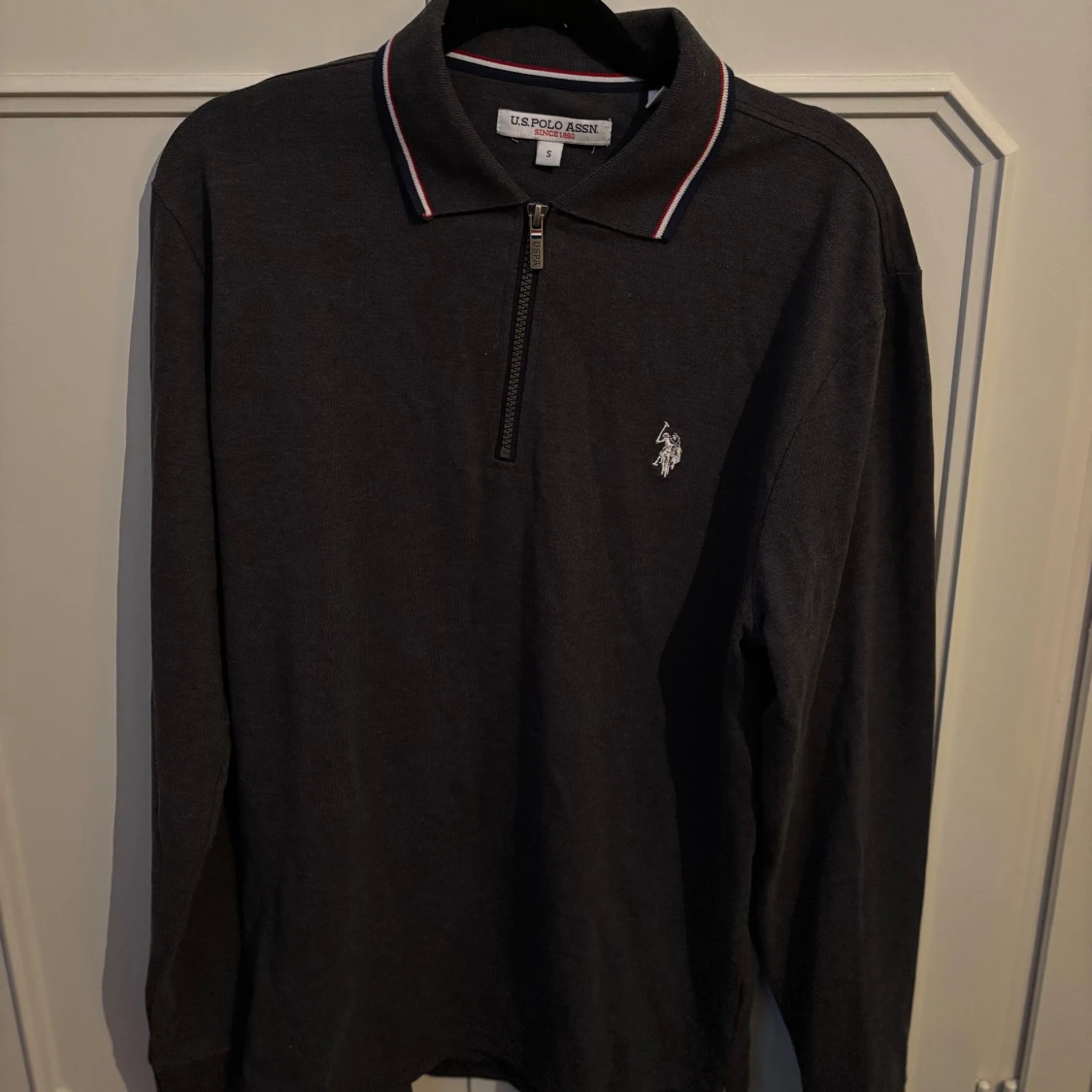 Svart pikétröja U.S. Polo Assn S