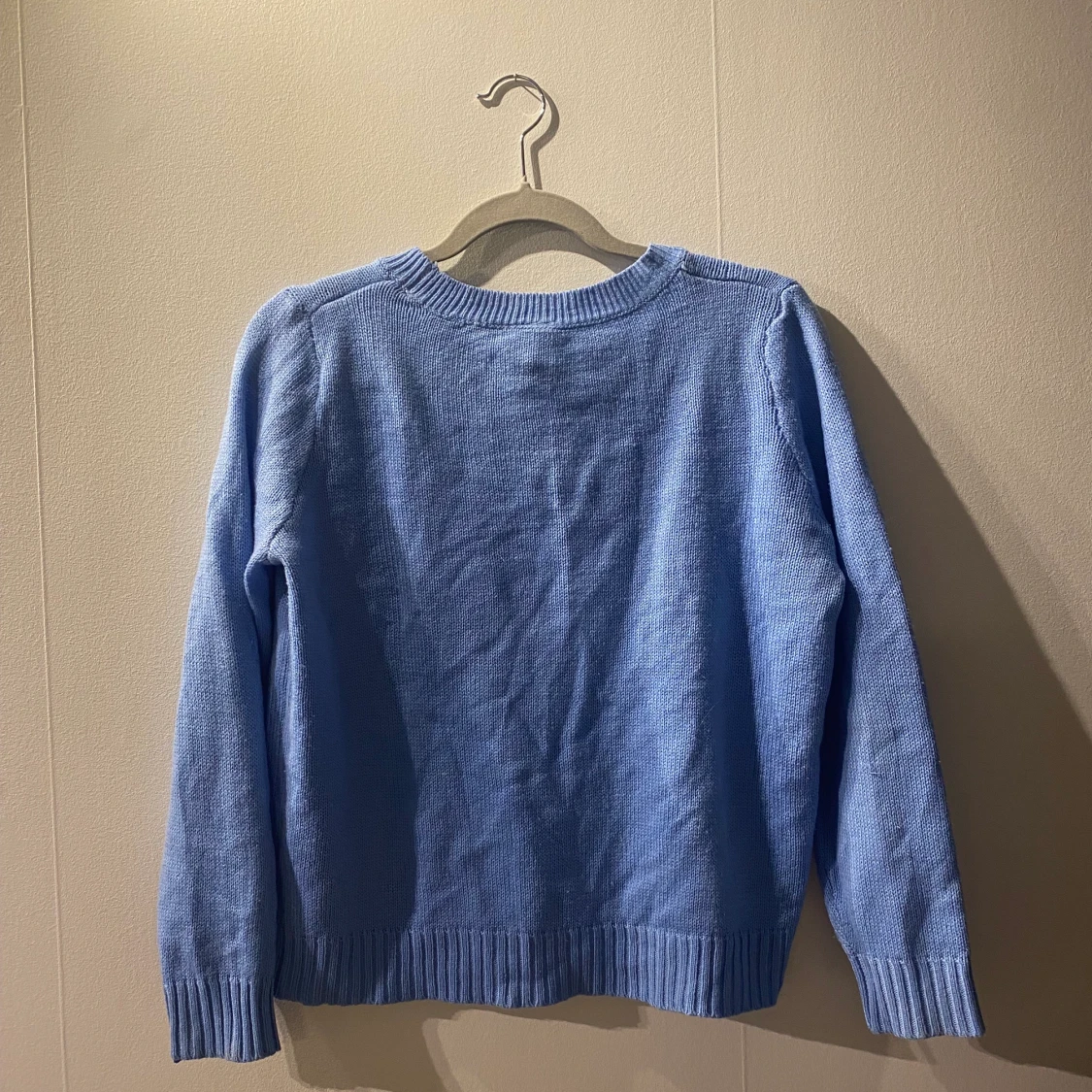 Blå stickad tröja - 90