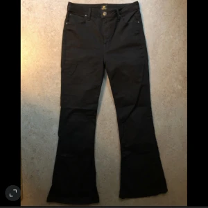 Bootcutjeans från Lee - W31 , L31  Breese  Nyskick! Sparsamt använda. 