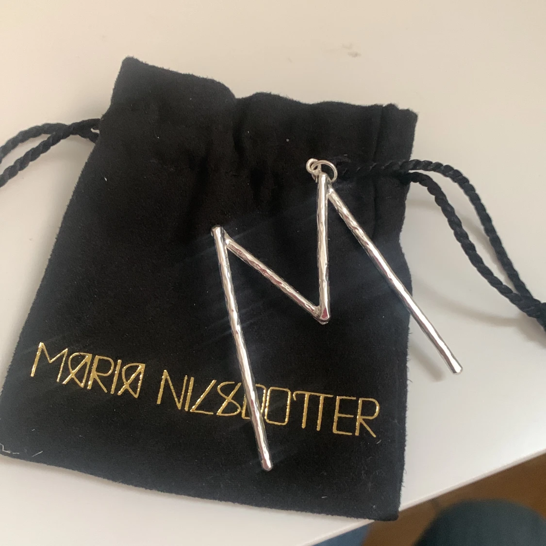 Maria Nilsdotter berlock  - 91