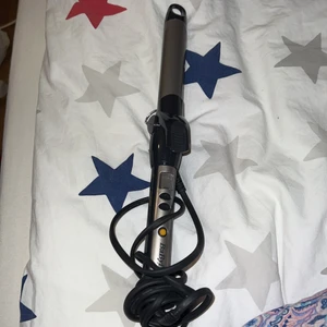 Locktång  - Mycket bra knappt använd locktång av babyliss till salu