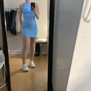 Klänning  - Pastellblå klänning 