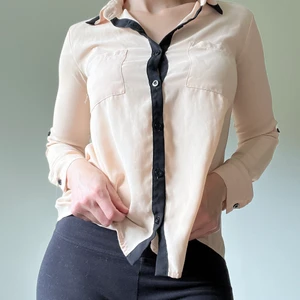 Beige and black blouse SMALL - Blouse is in good contrition. I bought it in USA. 
