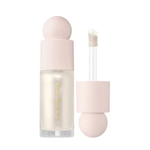 Rare Beauty liquid highlighter - Knappt använd, enbart testad ett fåtal gånger. Färg: Enlighten. Nypris: 359 kr. Frakt ingår!