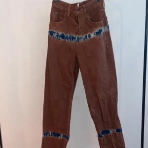 Urban outfiters Jeans  - Brown jeans from urban outfitters with cool denim print, regular waist, “boyfriend jeans” W25