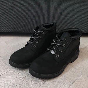 Timberland Nellie Chukka Waterproof Boots - Classic Timberlands, low ankle in black worn through only 1 winter season.   It served well and I'm letting go for a change in taste :)   Good, used condition:  - True to its original colour  - Used and cleaned - Naturally a few scratches on the the sole