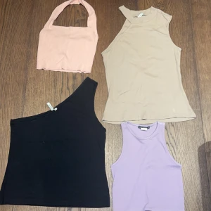 Toppar  - Den beiga och svarta är från Nelly i storlek M och den rosa och lila är från Chiquelle i storlek S. Köp alla för 150kr+frakt eller köp styckvis för 70 kr+frakt.
