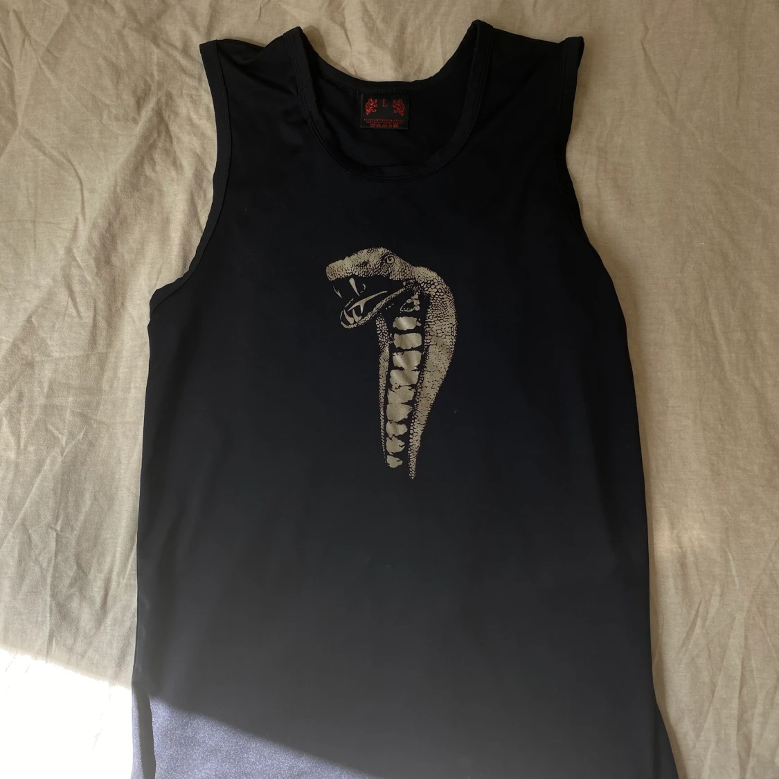 Sleeveless T-shirt - 90