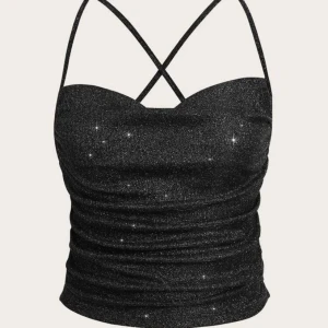 Glittrig topp - Helt ny glittrig topp i storlek m men passar s 