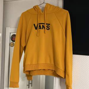 Gul/orange hoodie från vans med logga