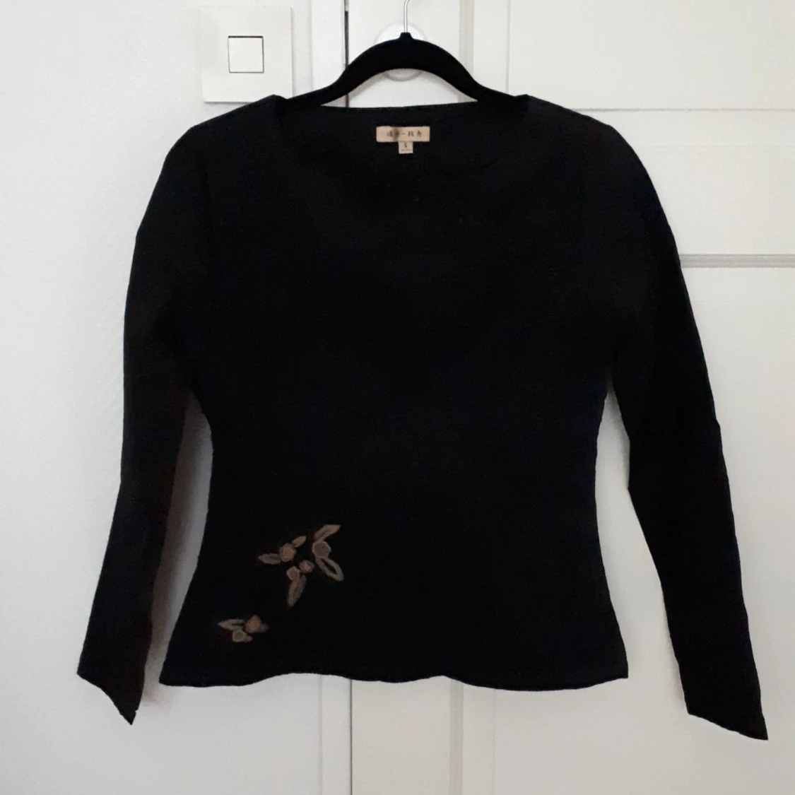 Kinesisk unik svart blus