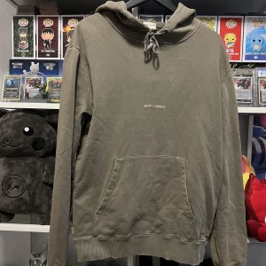 Saint Laurent Small Logo Hoodie Khaki - 9/10 skick, storlek Medium.