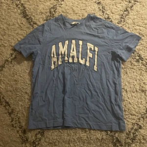 Ljusblå t-shirt - Ljusblå t-shirt med tryck från H&M