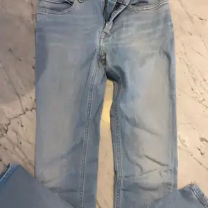 Blåa jeans från Calvin Klein. Knappt använda och i storlek 12. Inköpta på NK gbg.