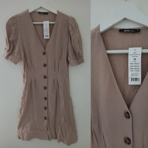 Beige klänning helt ny  - Helt ny med lapp, passar xs/s/m 