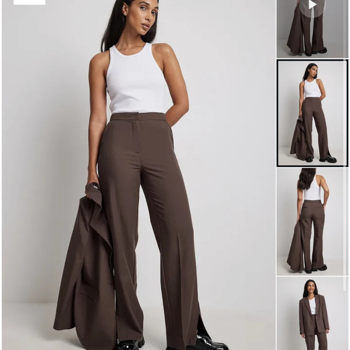 Bruna kostymbyxor med liten slits