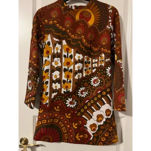 Vintage Klänning (mini dress)  - En kort vintage klänning i storlek 36-38 