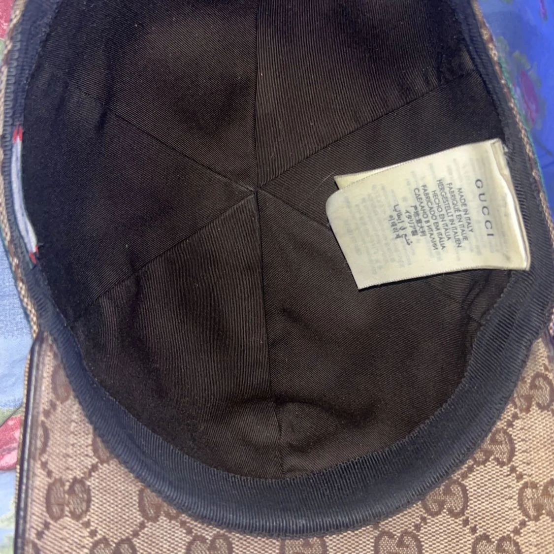 Gucci keps till salu