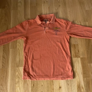 Aeronautica långärmad piké  - Aeronautica långärmad piké  Storlek: Står ingen storlek, är som en storlek M