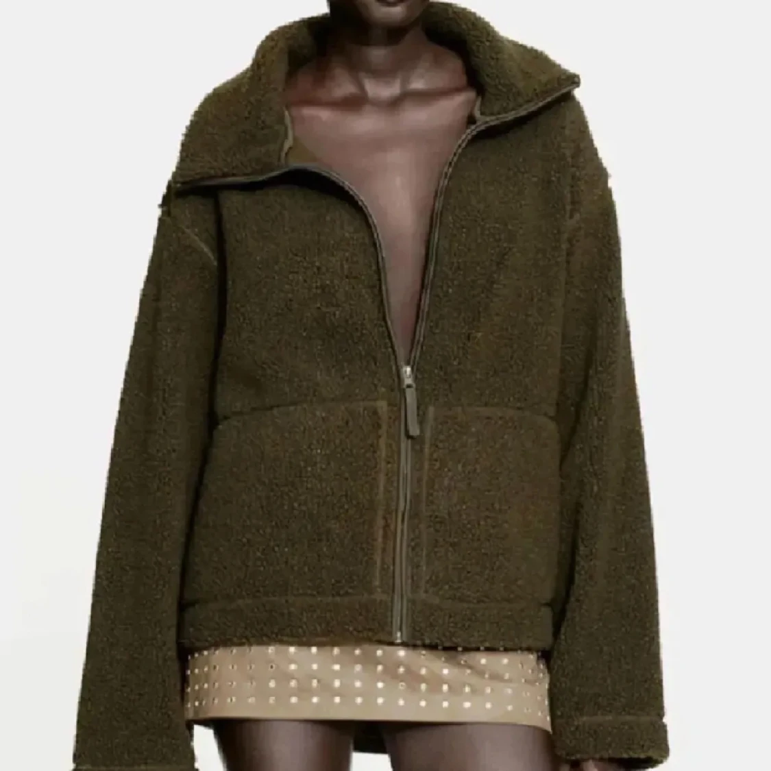 Grön teddyjacka