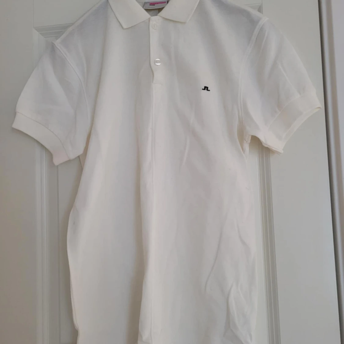 Vit pikétröja från J.Lindeberg