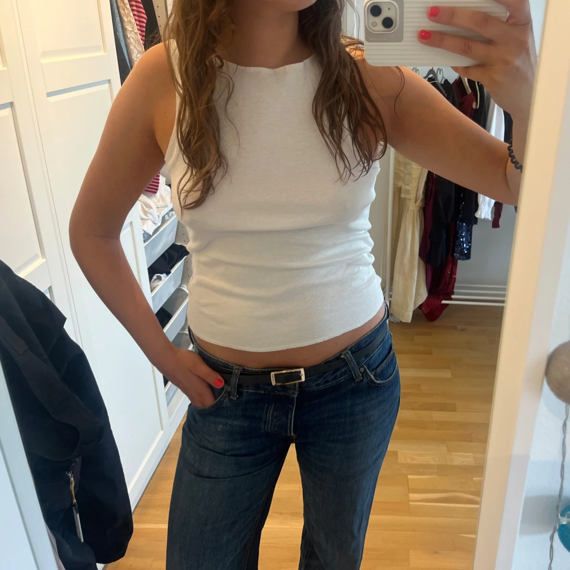 Vit ärmlös linnetopp från Mango