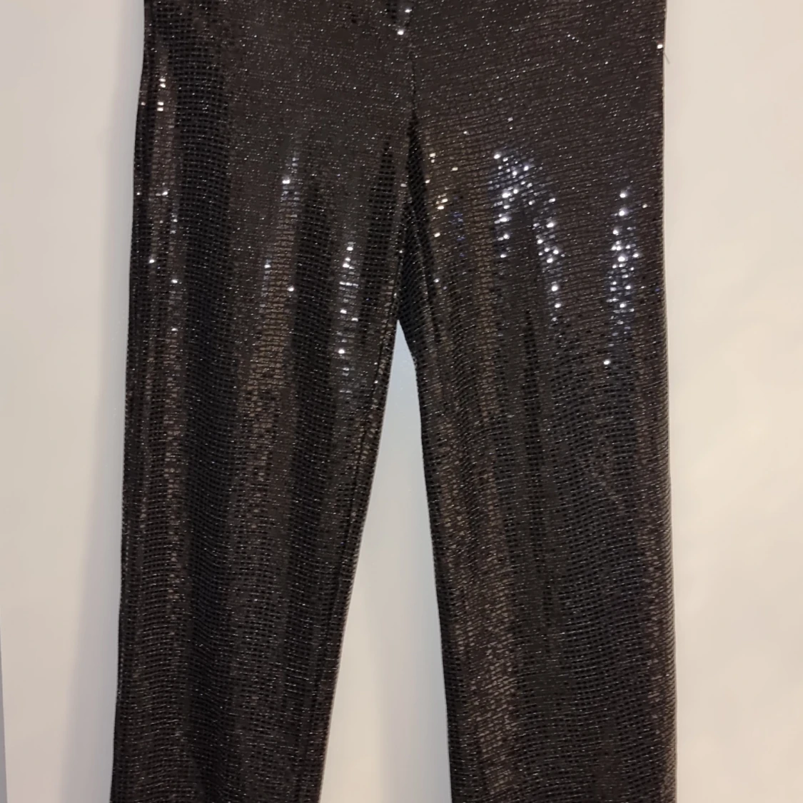 Svarta glittriga byxor  st S  helt nya