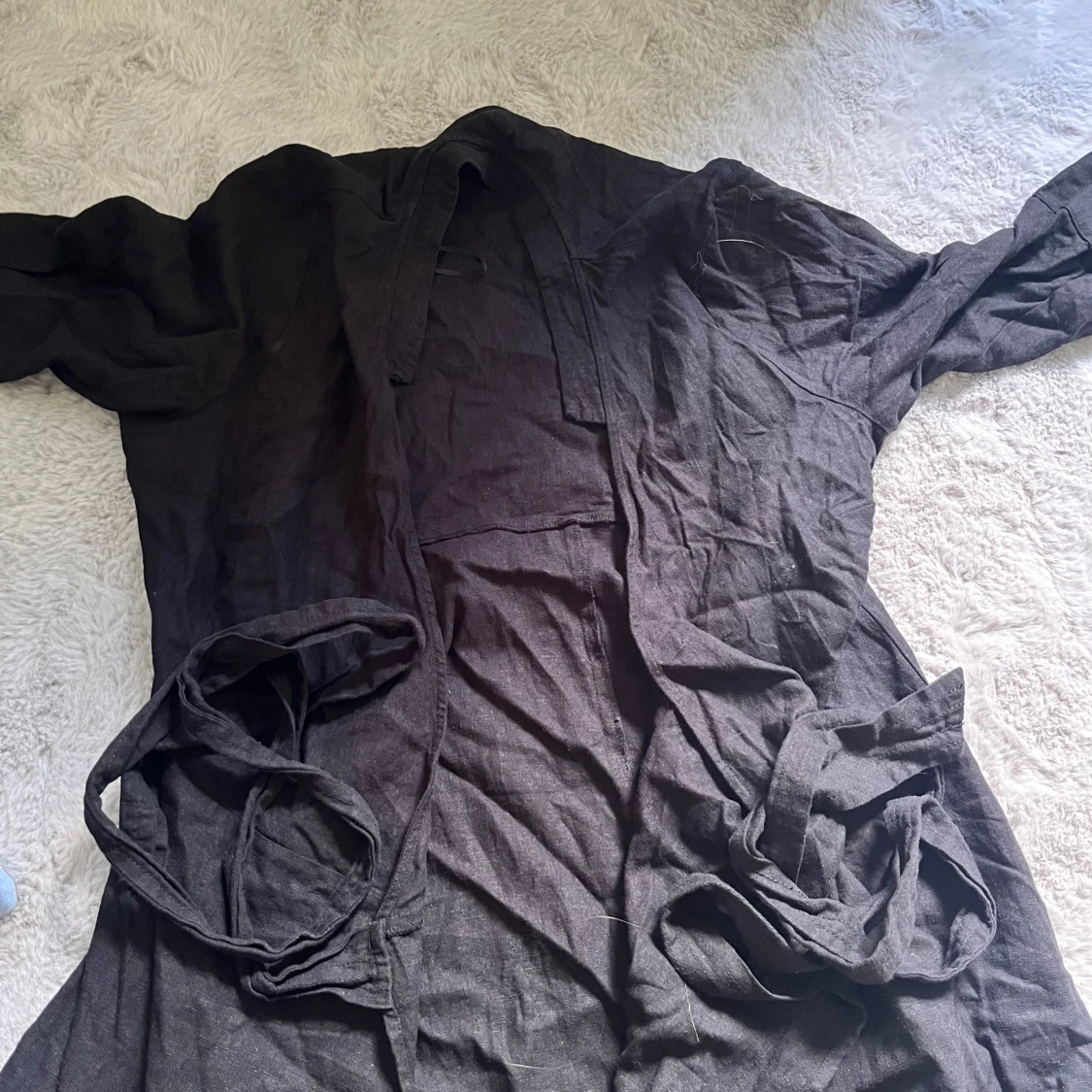 Svart långkofta från Lindex