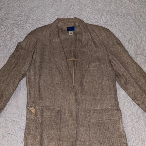Kappa från kenzo - Säljer en beige kappa från kenzo 