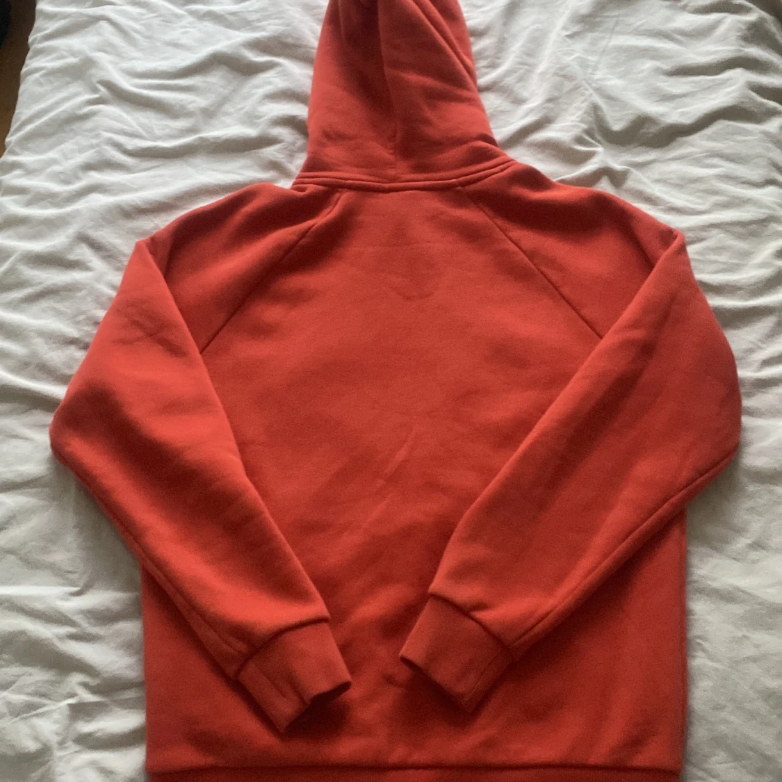 Orange hoodie från Peak Performance - 1