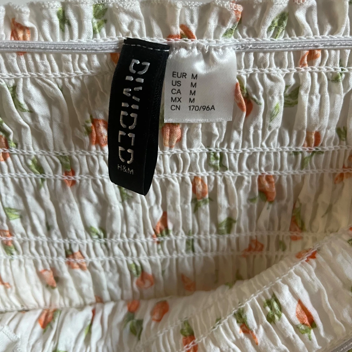 Vit blommig fintröja från H&M - 1