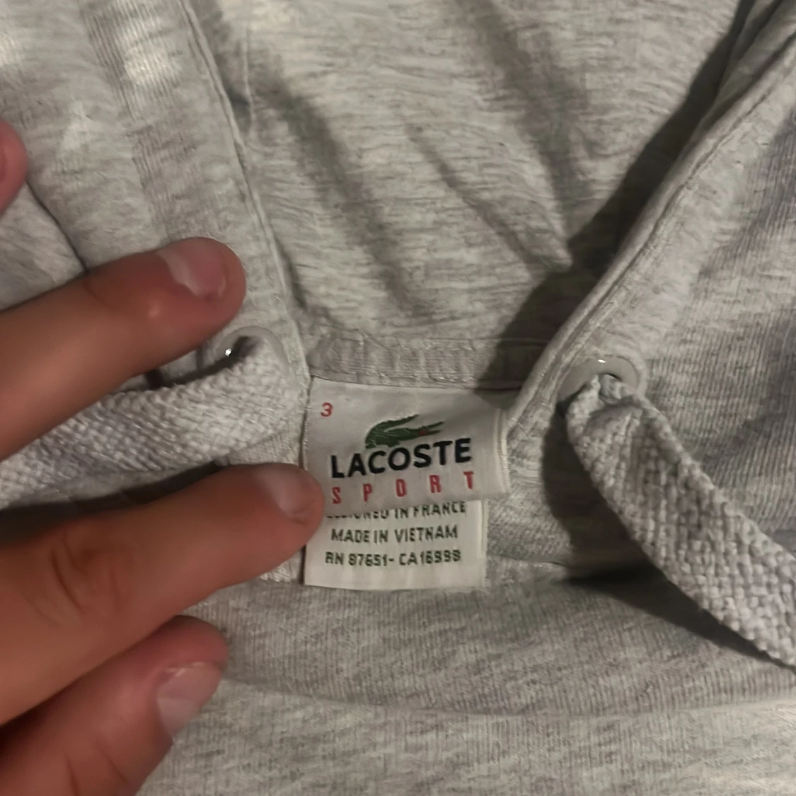Grå hoodie från Lacoste Sport - 1