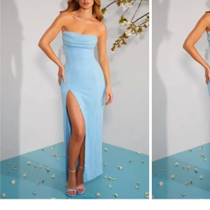 Ljusblå axelbandslös långklänning oh polly - Supersnygg ljusblå långklänning med axelbandslös design och hög slits på ena sidan. Klänningen har en figurnära passform och ett glittrigt tyg som fångar ljuset. Perfekt för dig som vill sticka ut med en elegant och modern look.