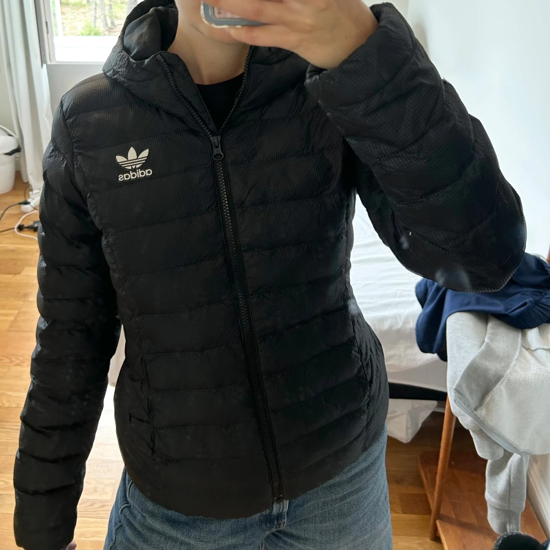 Svart pufferjacka från Adidas
