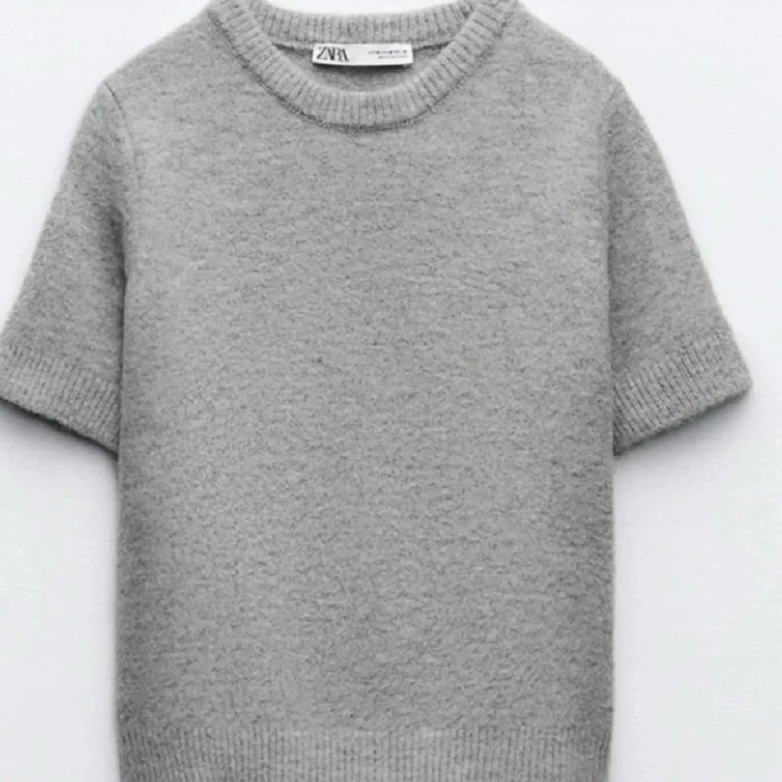 Grå stickad tröja från Zara