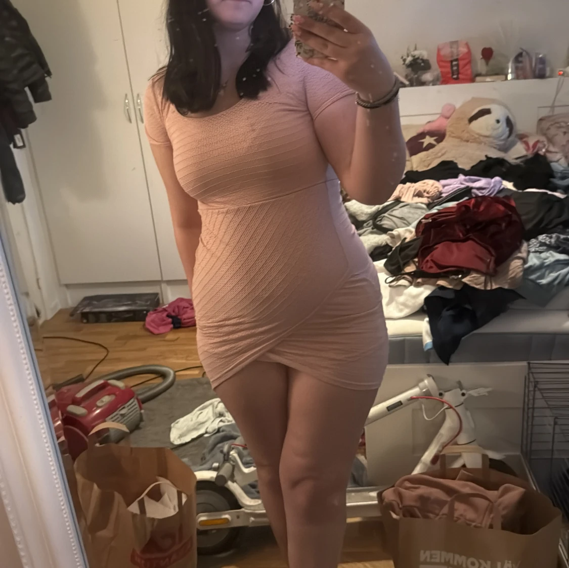 Ljusrosa stickad kortklänning