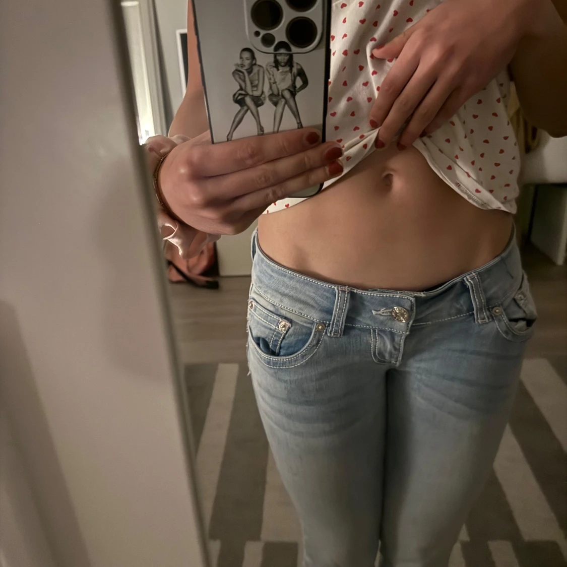 Ljusblå bootcut jeansbyxor super low rise g rise